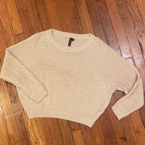 Neutral oversized knitted sweater